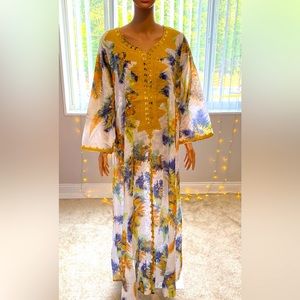 Crochet house Dress/Jalabia. Comes in two colors orange and yellow.